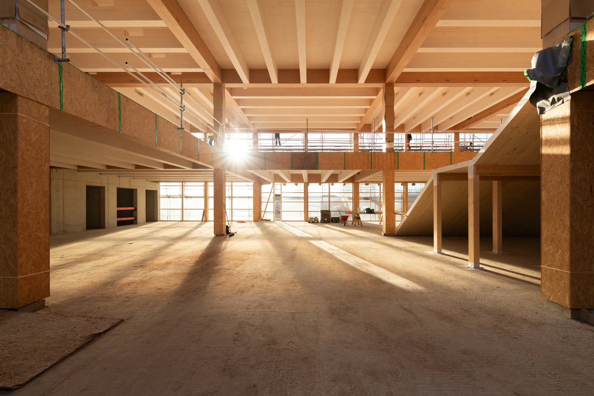 Gros œuvre d’un bâtiment à étages avec structure en hêtre lamellé