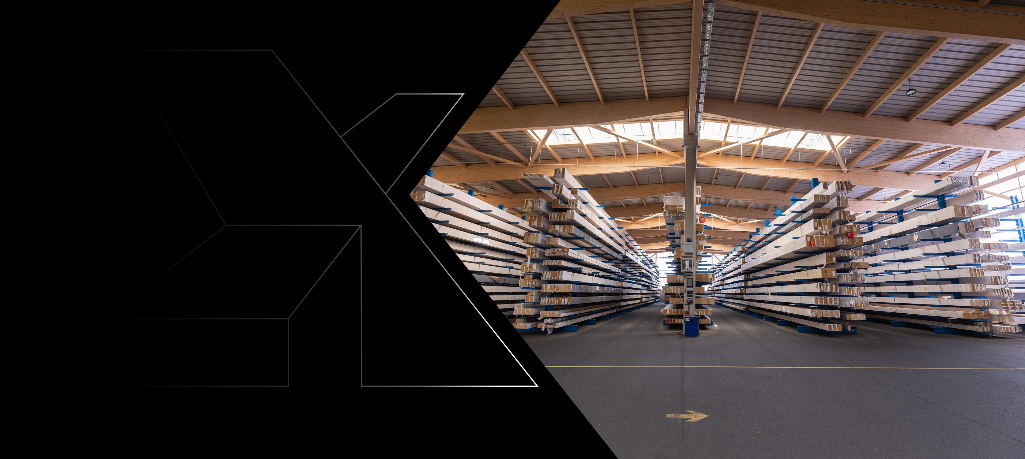Timber warehouse with cantilever racking and a column-free central aisle