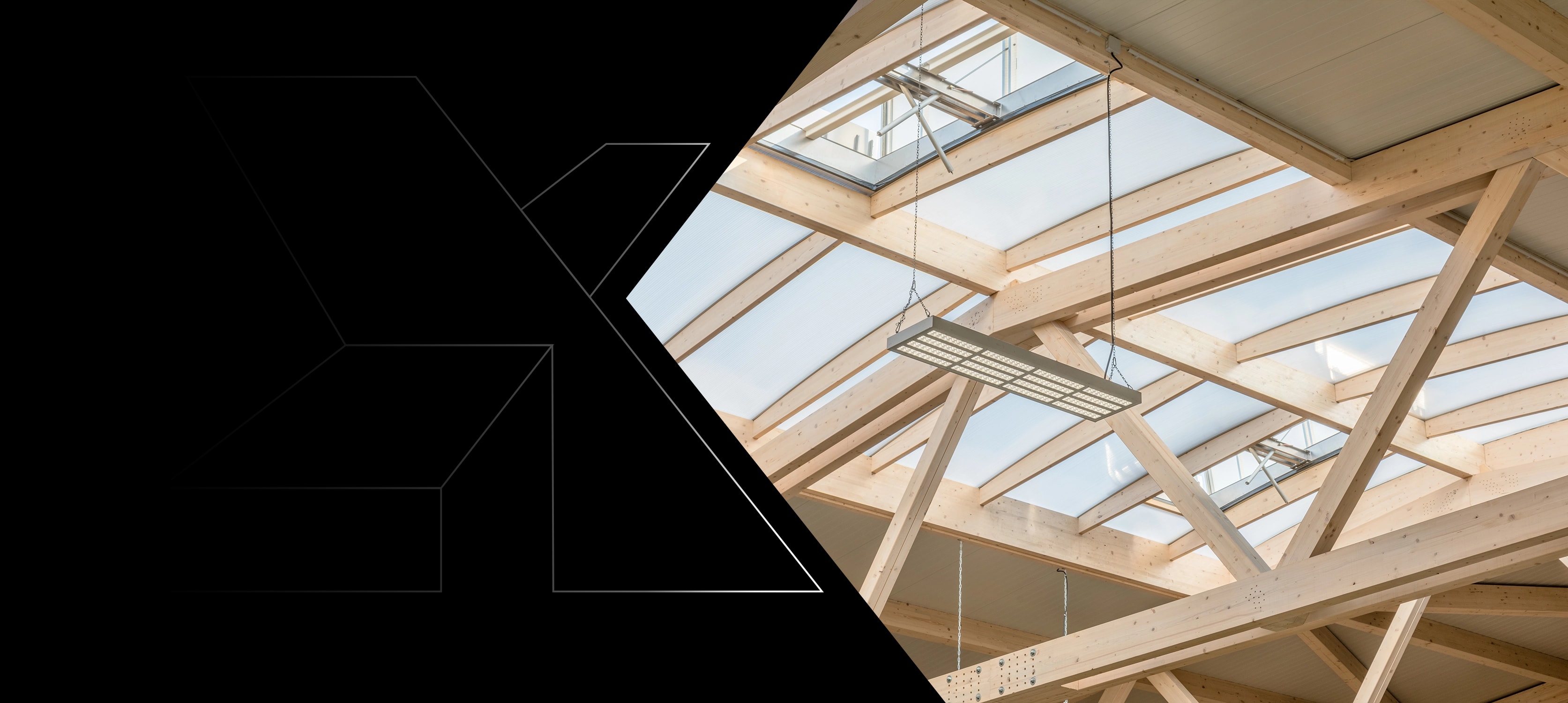 Glulam roof structure with light strips seen from below