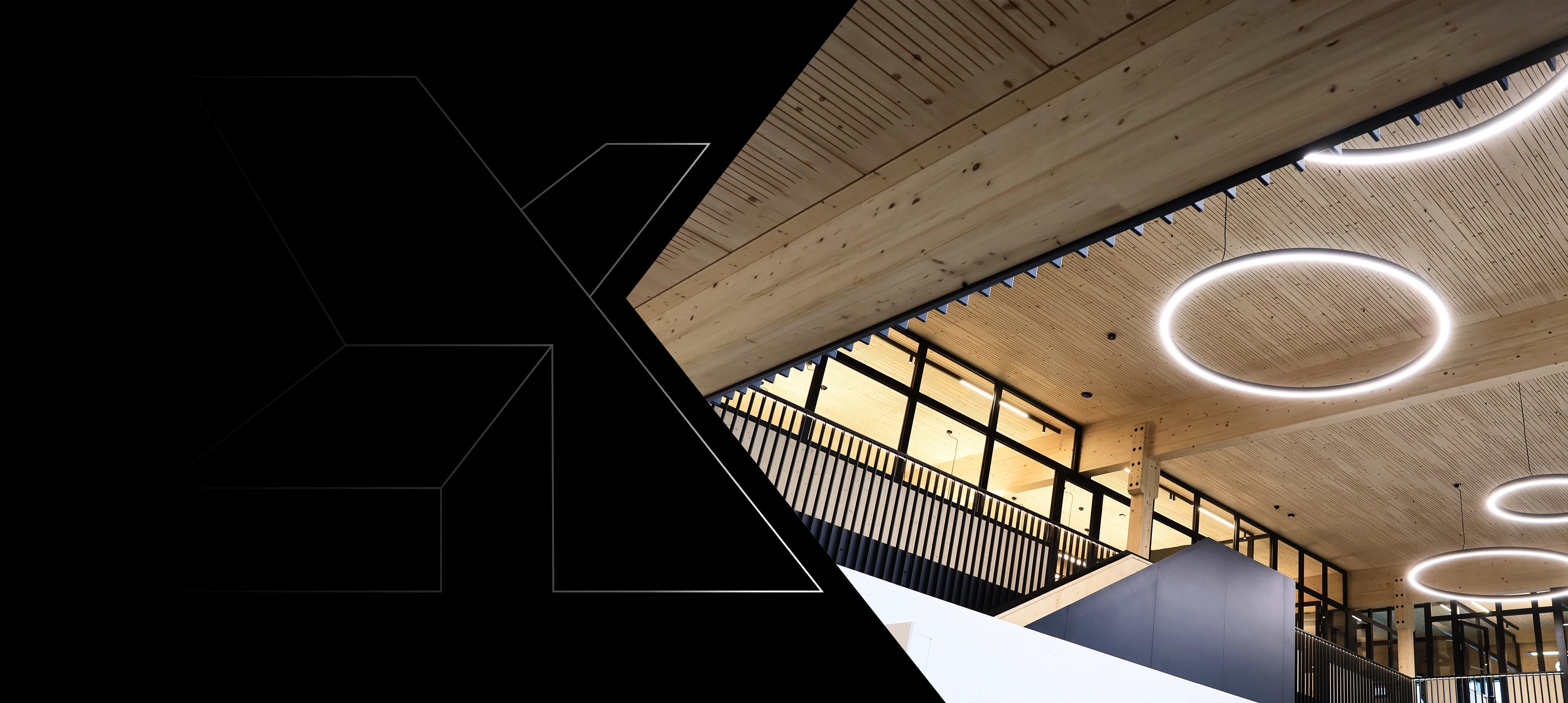 Foyer einer X-Wood®-Halle mit sichtbarer Holzdecke